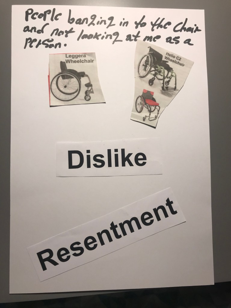 Freddie:The top of the page reads ‘people banging into the chair and not looking at me as a person.’ Below are two magazine cut-outs of wheelchairs and the words ‘dislike’ and ‘resentment.’
